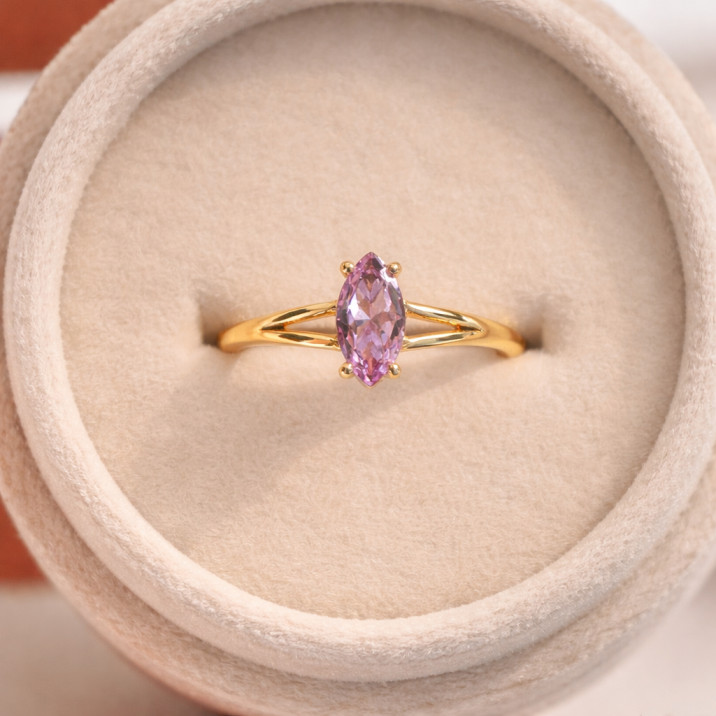 Elegant gold ring in velvet box